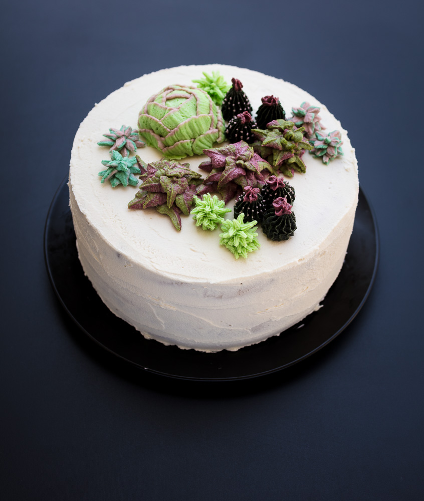 vegan banana cake decorated with buttercream succulents