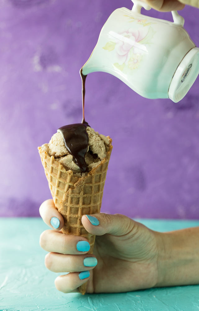 pouring dreamy sauce onto Butternut Squash Ice Cream