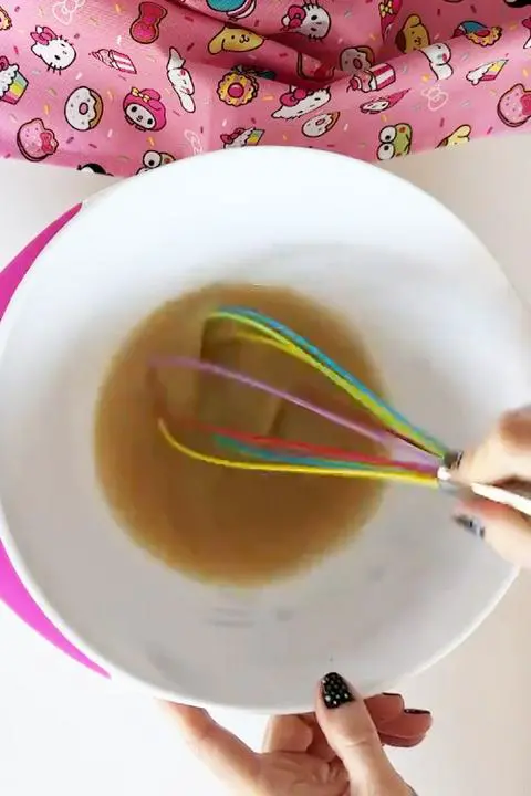 whisking the wet ingredients.