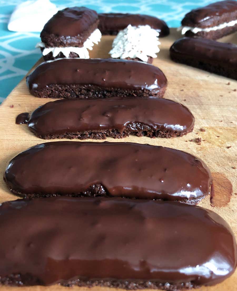 vegan chocodiles tops all dipped in chocolate ganache