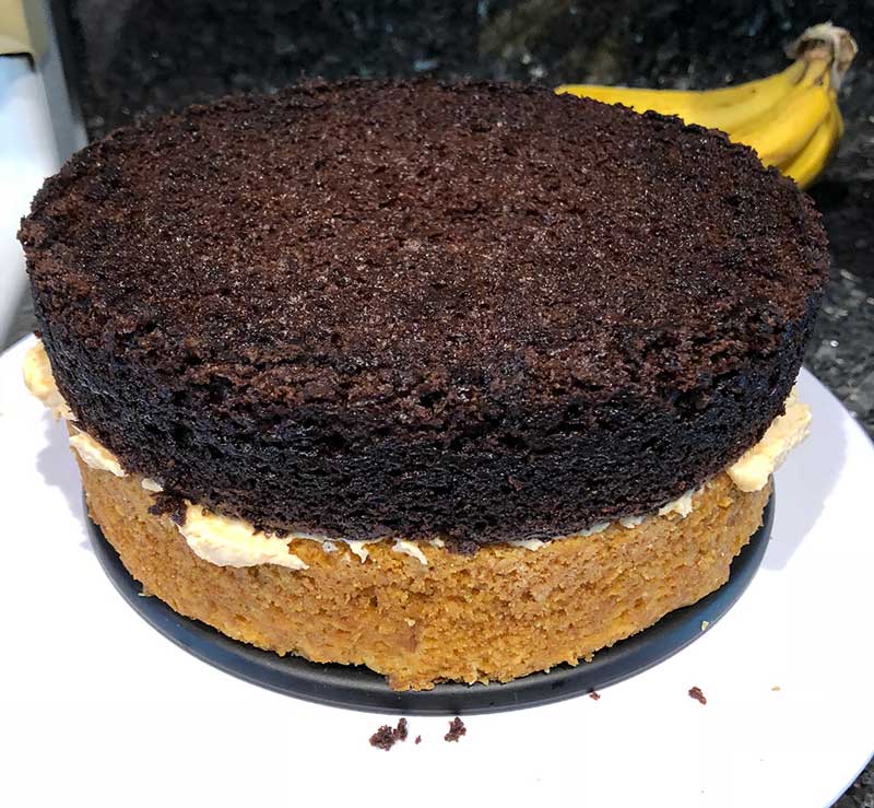 Assembling the vegan chocolate orange cake