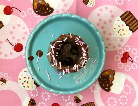 drizzling penguin coat on the vegan cookie dough cups