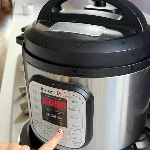 turning off the keep warm button on the instant pot.