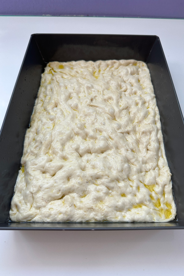 vegan focaccia-style detroit pizza dough ready for toppings