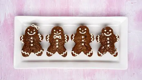 4 vegan gingerbread cakes next to each other on a plate.