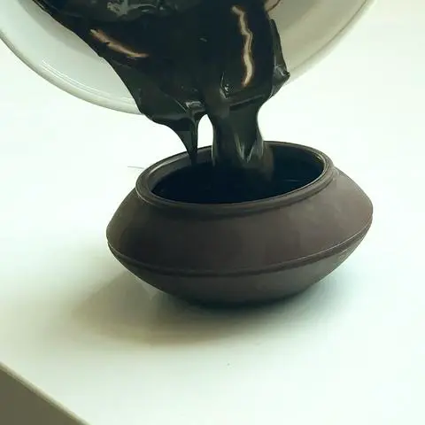 transferring melted chocolate into a decopen.