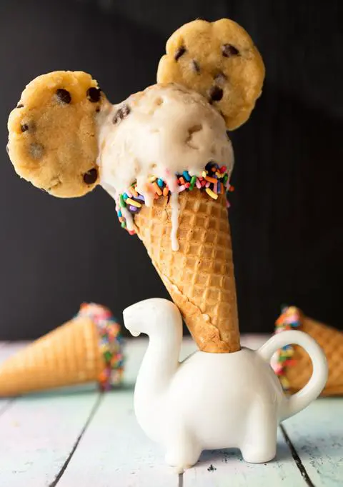 vegan cookie dough ice cream cone with chocolate chip cookie ears.