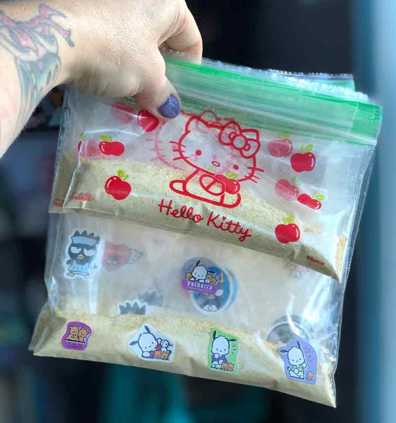 filling the paggies with the vegan cheese powder