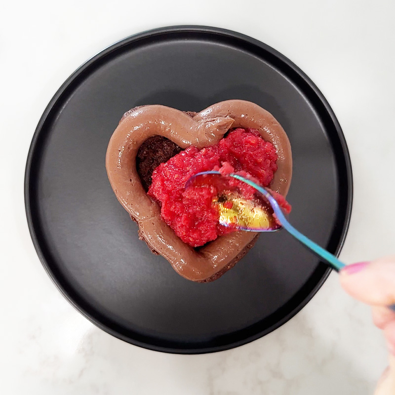 Adding the raspberry filling.
