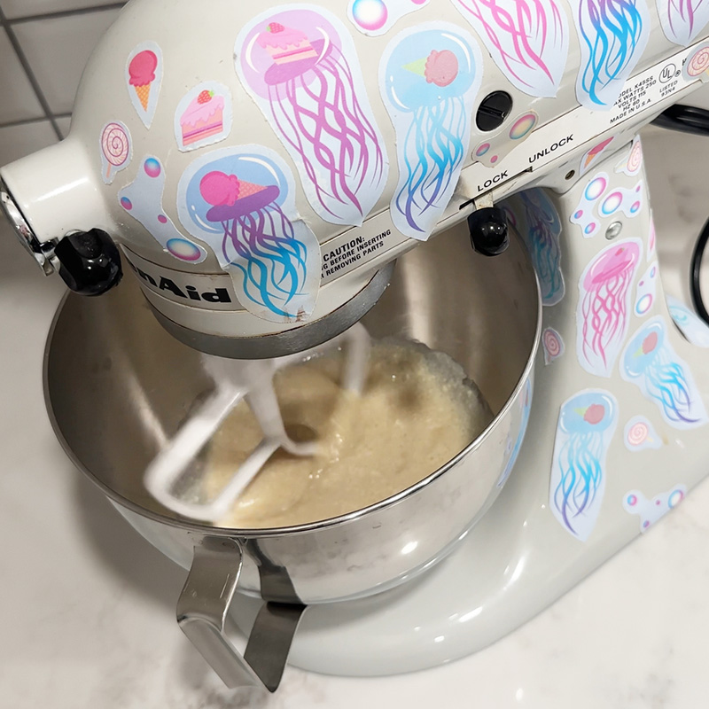 Mixing the wet ingredients with a stand mixer.