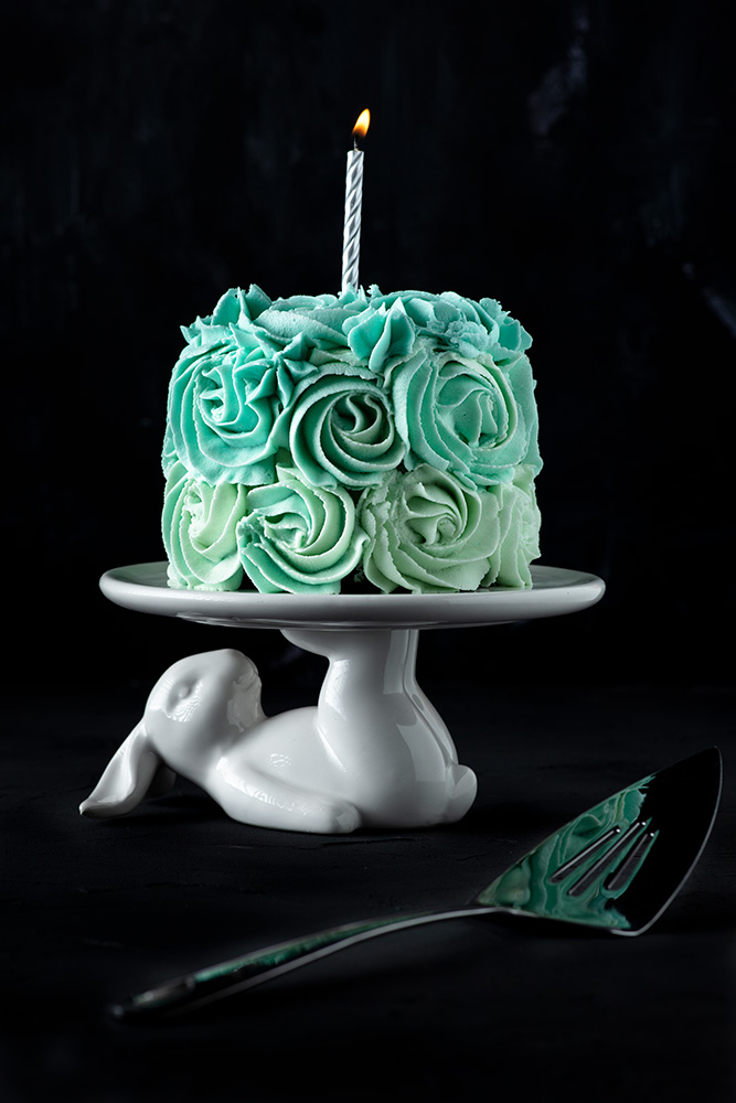 mini vegan ombre cake with a birthday candle