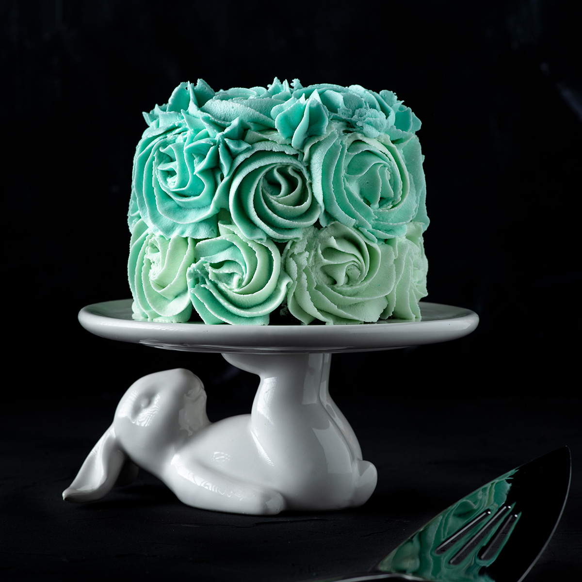 mini vegan chocolate cake with blue ombre vanilla frosting