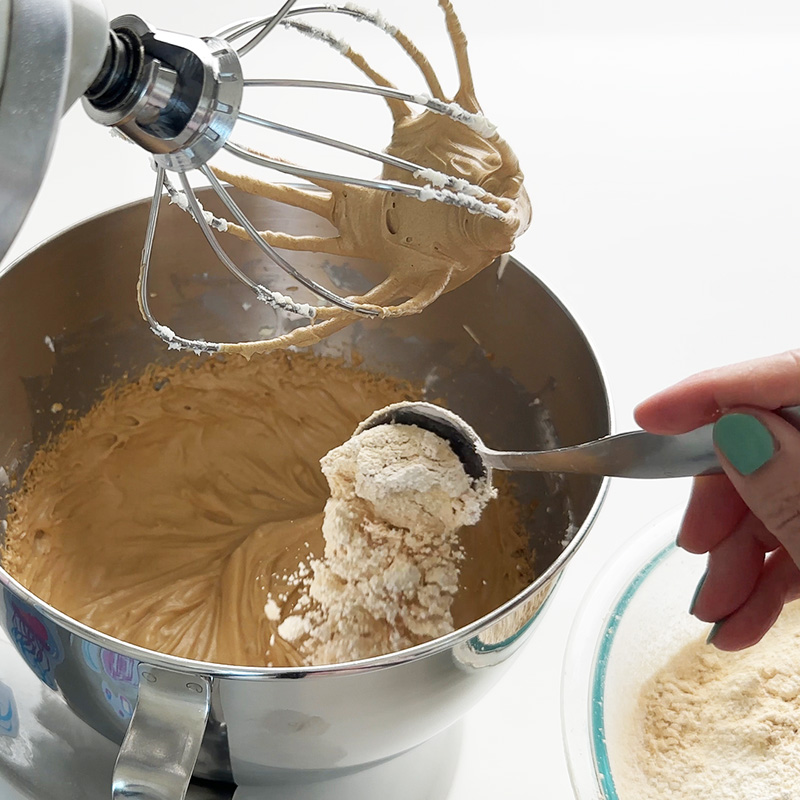 adding the sifted ingredients to the peanut butter filling.