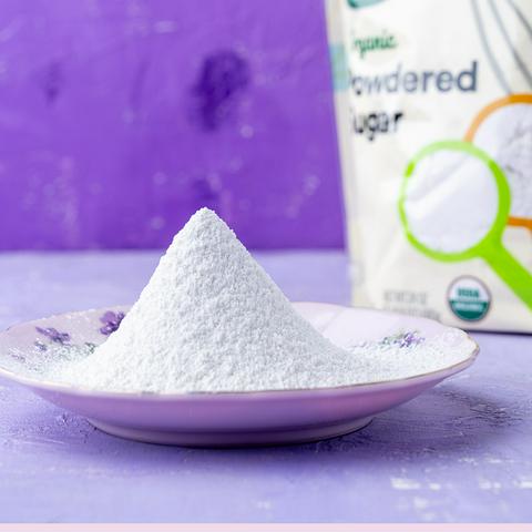 a saucer of sifted vegan powdered sugar