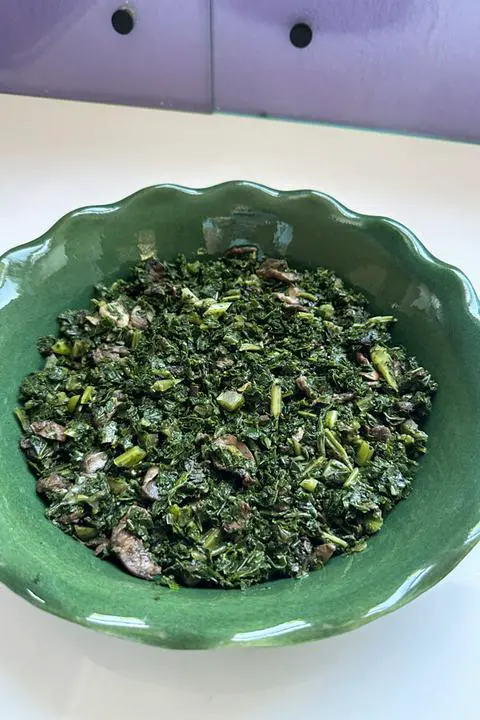 cooked veggies in the pie pan