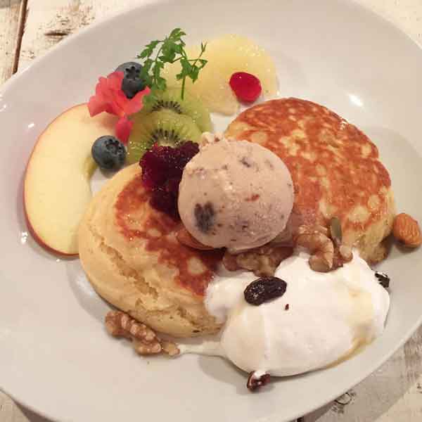 vegan pancakes with whipped cream and ice cream