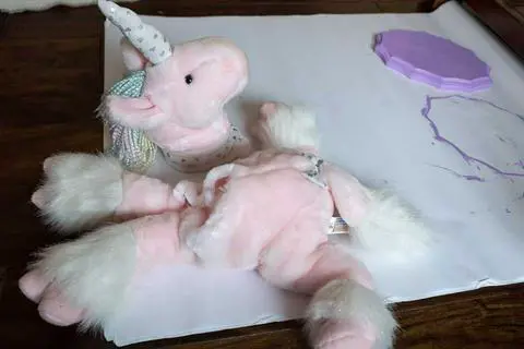 decapitated stuffed unicorn.