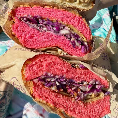 vegan sandwich on pink dutch crunch from Ike's.
