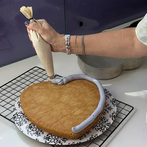 piping a frosting border.