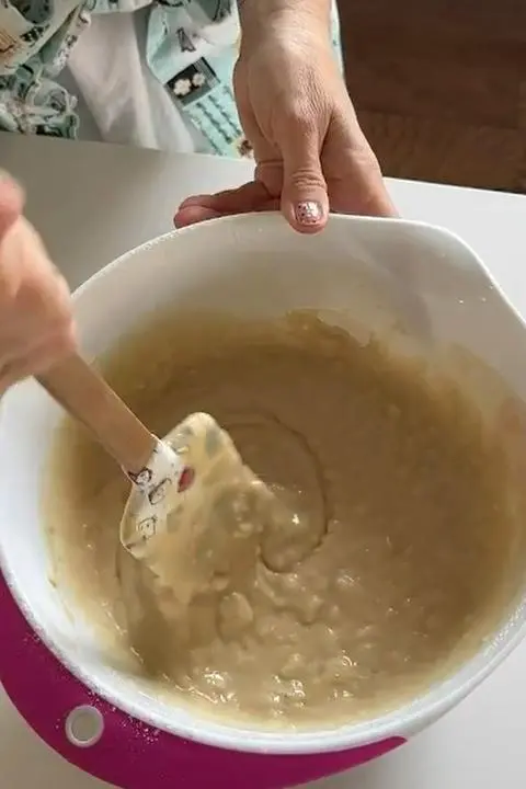 mixing the dry ingredients with the wet ingredients.